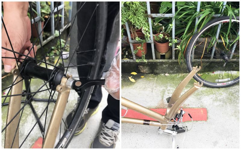 同時轉動快拆與螺帽,將前輪從車架上取下。(photo by 百穗)